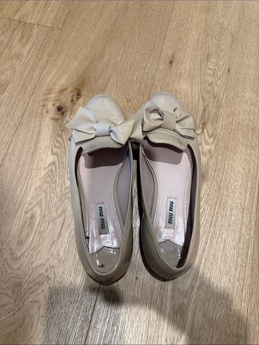 Miu Miu Patent Leather Bow Flats in Light Cream
